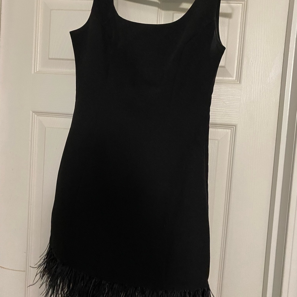 Endless Rose Black Sleeveless Mini Dress with Feather Hem